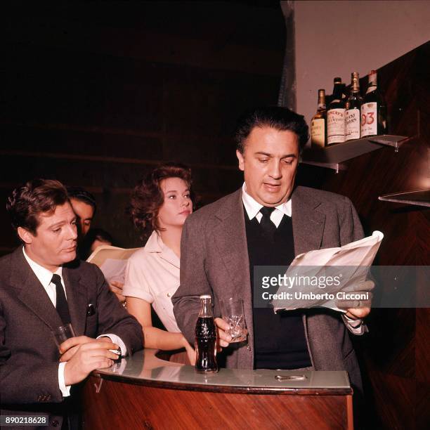 Italian film director Federico Fellini is with Italian actress Lea Massari and actor Marcello Mastroianni during the audition for the movie 'La Dolce...