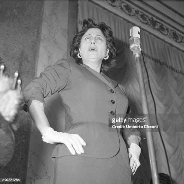 Italian stage and film actress Anna Magnani celebrates at the 'Excelsior Hotel' for having received the 'Viola D'oro', Rome 1956.