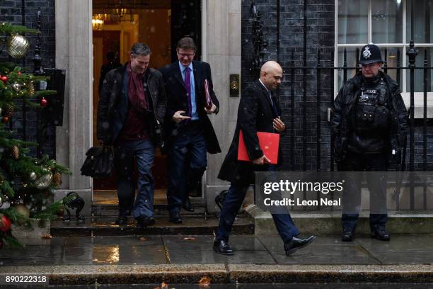 Work and Pensions Secretary David Gauke , Business Secretary Greg Clark and Communities Secretary Sajid Javid leave Downing Street, following a...