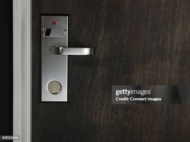 key in a hotel room door - doorknob stock pictures, royalty-free photos & images