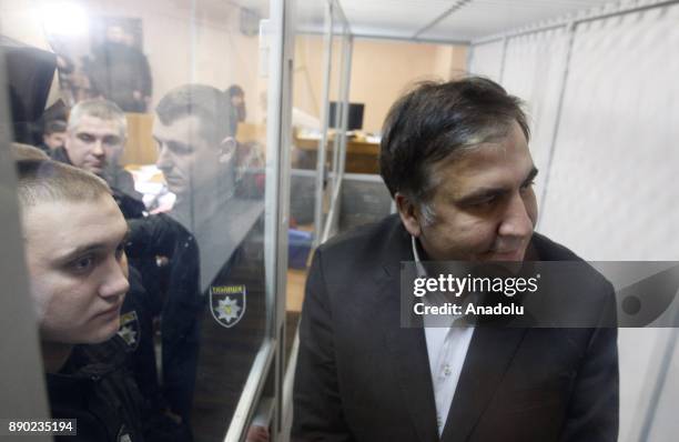 Former Georgian president and ex-governor of the Odessa region of Ukraine Mikheil Saakashvili attends a court hearing in Kiev, Ukraine, on December...