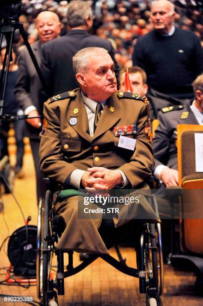 Croatian war weteran Marijan Biscan looks on before the start of a commemoration ceremony honouring the late Croatian general Slobodan Praljak in...