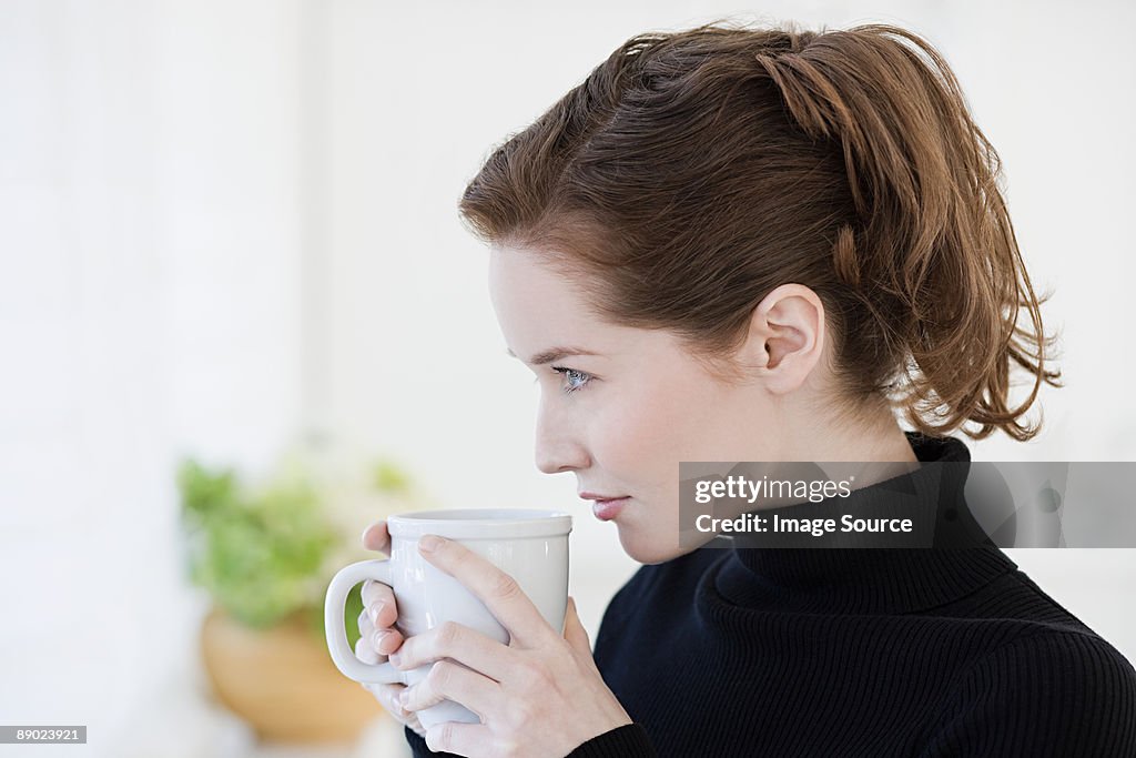 Young woman with drink