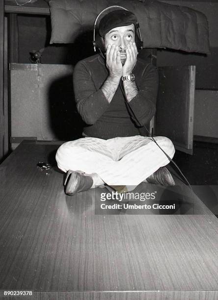 Italian singer-songwriter, musician and actor Lucio Dalla records a song in his studio, Rome 1971.