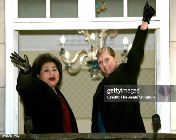 Beatrice Fihn, Executive Director International Campaign to Abolish Nuclear Weapons and Setsuko Thurlow wave prior to the dinner at the Grand Hotel...