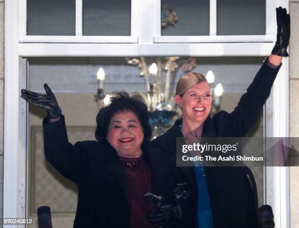 Beatrice Fihn, Executive Director International Campaign to Abolish Nuclear Weapons and Setsuko Thurlow wave prior to the dinner at the Grand Hotel...