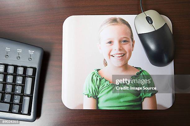 personalised mousepad with photo of little girl on it - mouse pad stock pictures, royalty-free photos & images