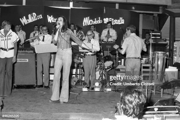 Italian singer and TV presenter Gigliola Cinquetti performs at the club 'La Bussola', Viareggio 1975.