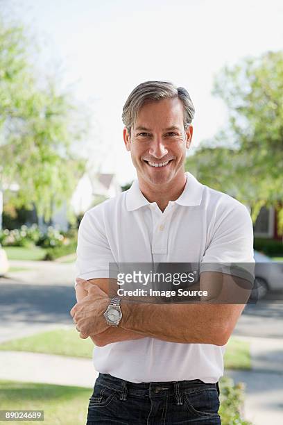 portrait of a man outdoors - grey polo shirt stock pictures, royalty-free photos & images