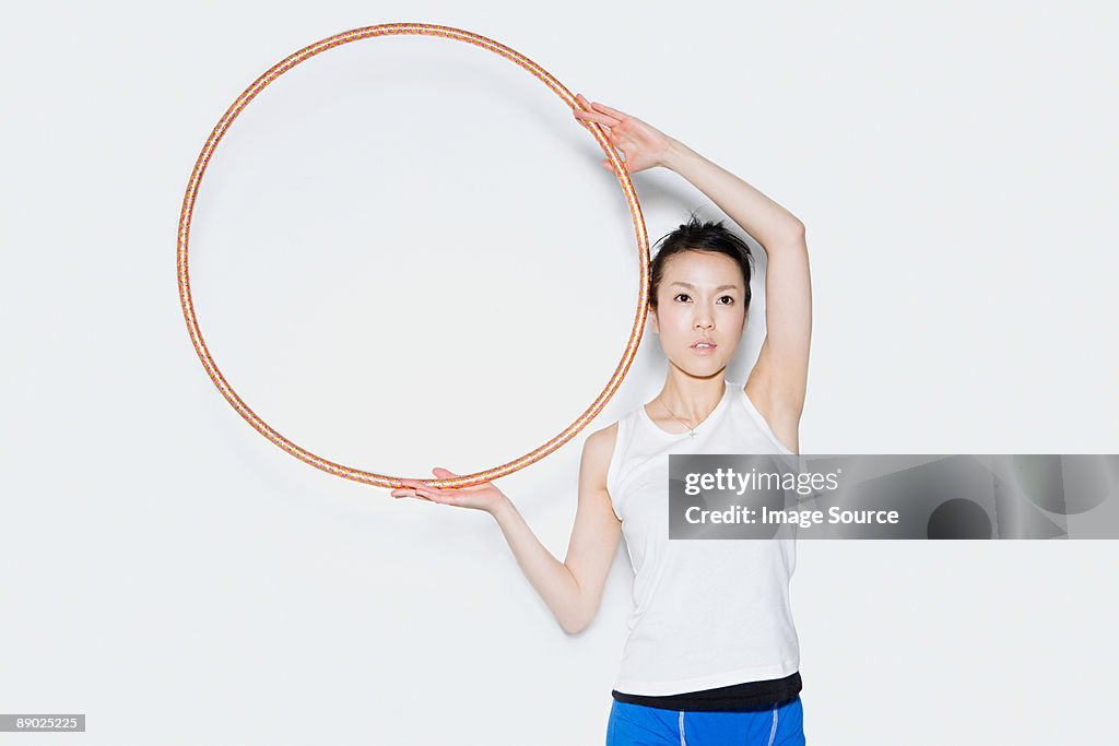 Woman holding hoop