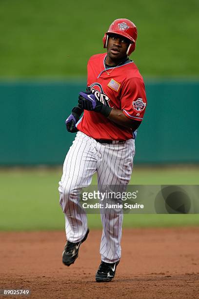 Futures All-Star Eric Young of the Colorado Rockies rounds the bases after hitting a home run during the 2009 XM All-Star Futures Game at Busch...