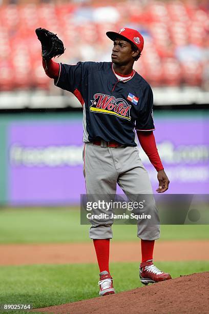 World Futures All-Star Yohan Flande of the Philadelphia Phillies receives the ball during the 2009 XM All-Star Futures Game at Busch Stadium on July...