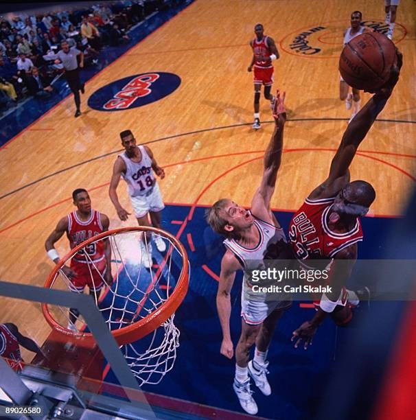 Playoffs: Aerial view of Chicago Bulls Michael Jordan in action, dunk vs Cleveland Cavaliers Craig Ehlo . Game 5. Richfield, OH 5/7/1989 CREDIT: Carl...