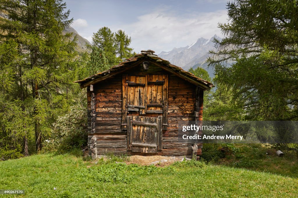 Traditional wooden barn or hut in the mountains above Zermatt, Switzerland, Swiss Alps