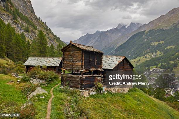 historic wooden barns, chalets or huts in the mountains above zermatt, switzerland, swiss alps - alpine larch stock pictures, royalty-free photos & images