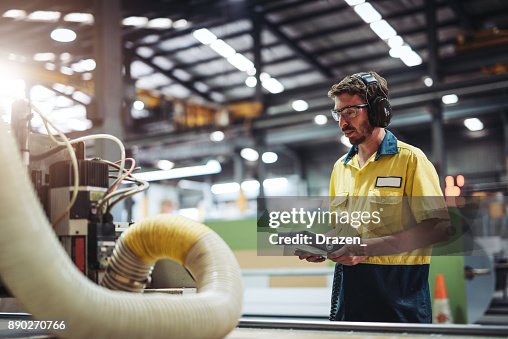 Jobe Using Machine Employee In Australia Working With Automated Machine High-Res Stock ...