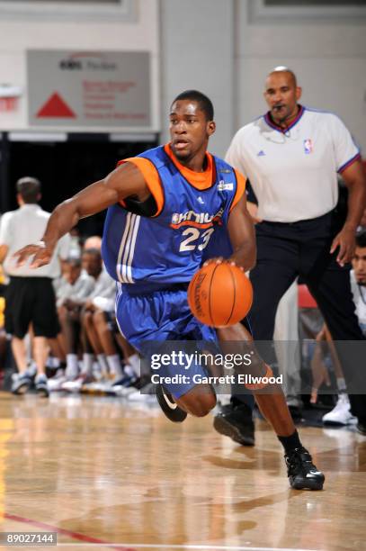 Toney Douglas of the New York Knicks dribbles against the Memphis Grizzlies during NBA Summer League presented by EA Sports at Cox Pavilion July 14,...