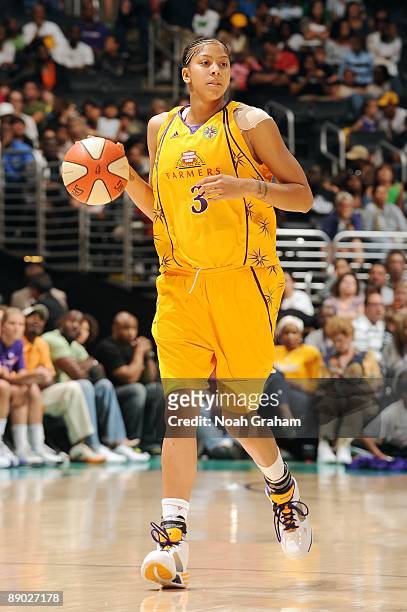 Candace Parker of the Los Angeles Sparks moves the ball up court during the game against the Phoenix Mercury at Staples Center on July 5, 2009 in Los...