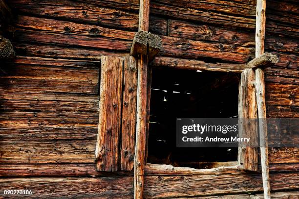 close-up of wooden barn door. above zermatt, switzerland, swiss alps - lyalls lärche stock-fotos und bilder