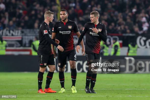 Lars Bender of Bayer Leverkusen, Sven Bender of Bayer Leverkusen and Jonathan Tah of Bayer Leverkusen celebrate after winning the Bundesliga match...