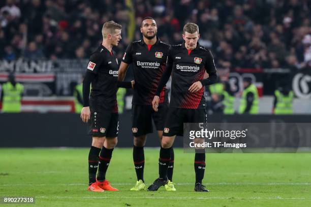 Lars Bender of Bayer Leverkusen, Sven Bender of Bayer Leverkusen and Jonathan Tah of Bayer Leverkusen celebrate after winning the Bundesliga match...