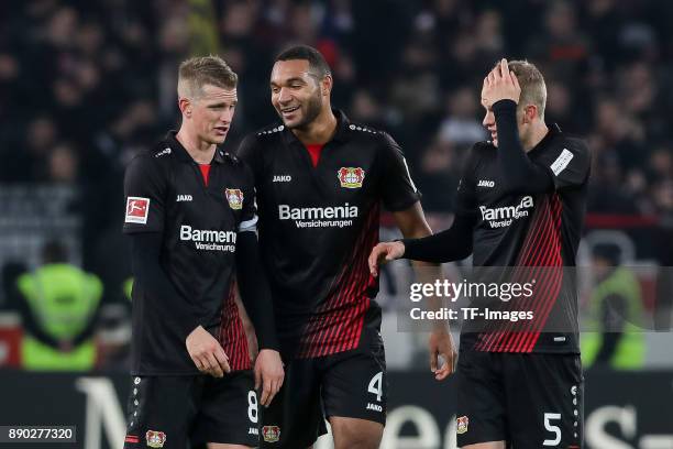 Lars Bender of Bayer Leverkusen, Sven Bender of Bayer Leverkusen and Jonathan Tah of Bayer Leverkusen celebrate after winning the Bundesliga match...