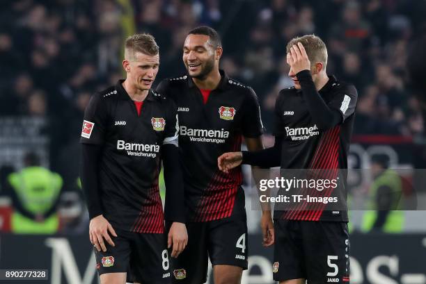 Lars Bender of Bayer Leverkusen, Sven Bender of Bayer Leverkusen and Jonathan Tah of Bayer Leverkusen celebrate after winning the Bundesliga match...