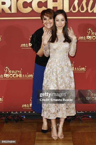 Lucia Ocone and Tess Masazza attend 'Poveri Ma Ricchissimi' photocall on December 11, 2017 in Rome, Italy.