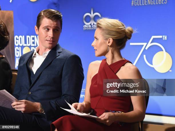 Actors Garrett Hedlund and Kristen Bell speak during Moet & Chandon Toasts The 75th Annual Golden Globe Awards Nominations at The Beverly Hilton...