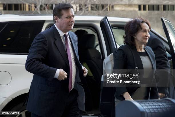 Paul Manafort, former campaign manager for Donald Trump, and his wife Kathleen Manafort, right, arrive at the U.S. Courthouse for a status conference...