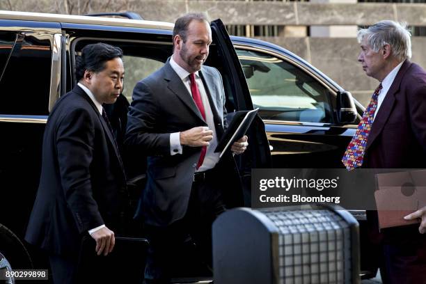 Rick Gates, former deputy campaign manager for Donald Trump, center, arrives at the U.S. Courthouse for a status conference in Washington, D.C.,...