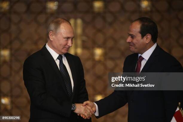 Russian President Vladimir Putin shakes hands with Egyptian President Abdel Fattah el-Sisi during their meeting on December 11, 2017 in Cairo, Egypt....