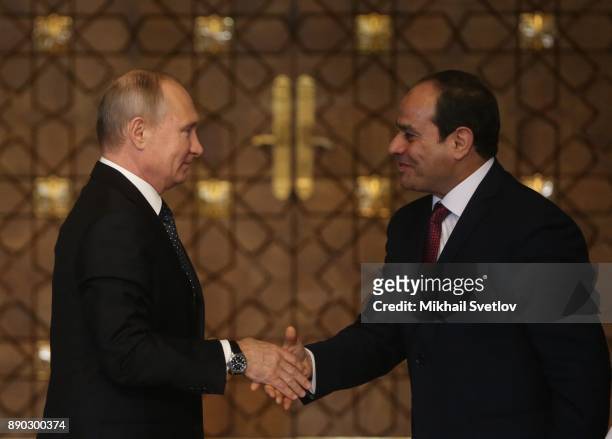 Russian President Vladimir Putin shakes hands with Egyptian President Abdel Fattah el-Sisi during their meeting on December 11, 2017 in Cairo, Egypt....