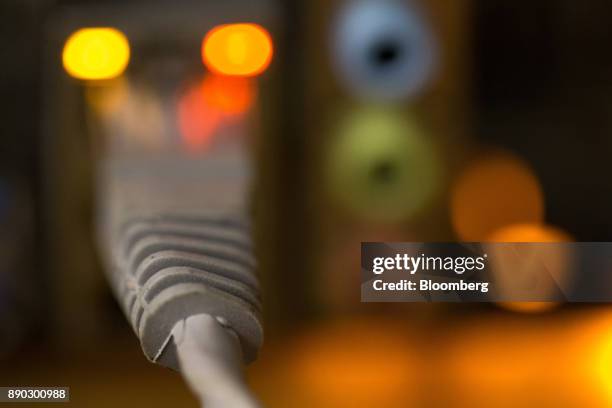 An electrical cable connects to a transformer used to power cryptocurrency mining machines at the SberBit mining 'hotel' in Moscow, Russia, on...