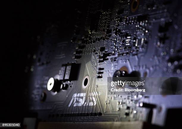 Computer chips sit on a motherboard used in cryptocurrency mining machines at the SberBit mining 'hotel' in Moscow, Russia, on Saturday, Dec. 9,...