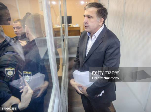 Former Georgian president and ex-governour of Odessa Mikheil Saakashvili is seen in a cage of Pechersk district court during the hearing, Kyiv...