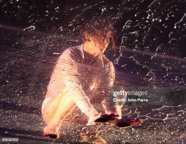 Fuerza Bruta is performing on stage during Fuerza Bruta at Adrienne Arsht Center on July 14, 2009 in Miami, Florida.