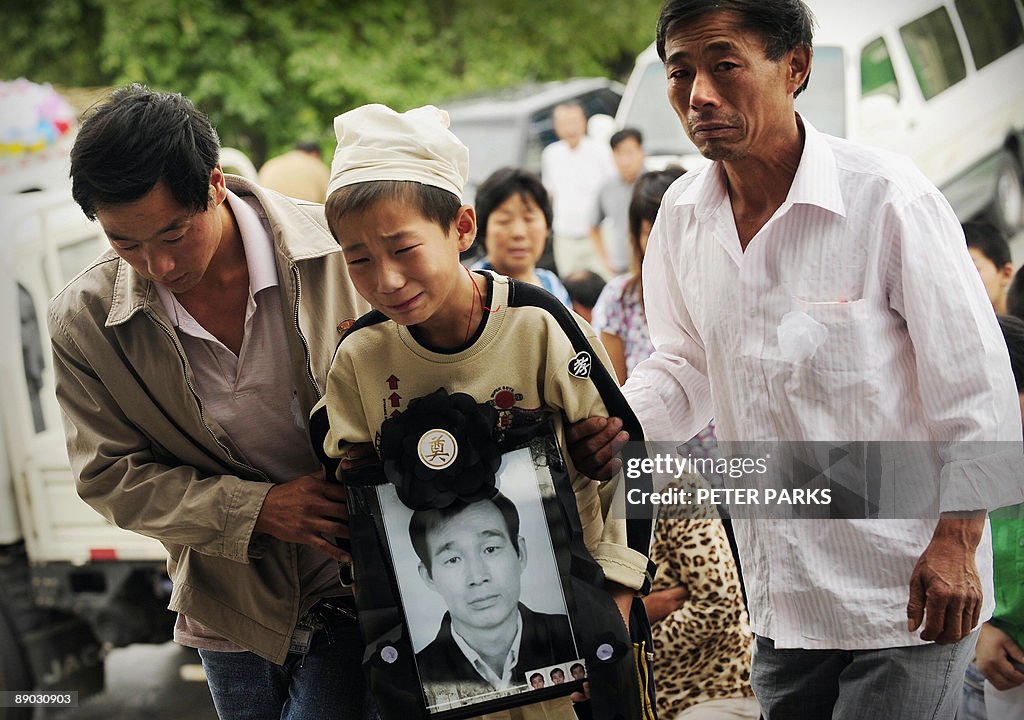 TO GO WITH China-unrest-Xinjiang-grief,F