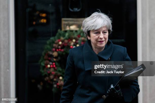 British Prime Minister Theresa May leaves Number 10 Downing Street on December 11, 2017 in London, England. Mrs May is to address MPs in Parliament...