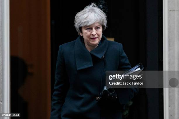 British Prime Minister Theresa May leaves Number 10 Downing Street on December 11, 2017 in London, England. Mrs May is to address MPs in Parliament...