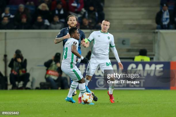 Virgil Misidjan of Ludogorets, Jacek Goralski of Ludogorets and Eugen Polanski of Hoffenheim battle for the ball during the UEFA Europa League group...