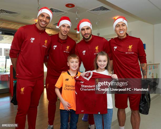 Liverpool players Joel Matip, Marko Grujic, Emre Can and Roberto Firmino making their annual visit to Alder Hey Children's Hospital on December 11,...