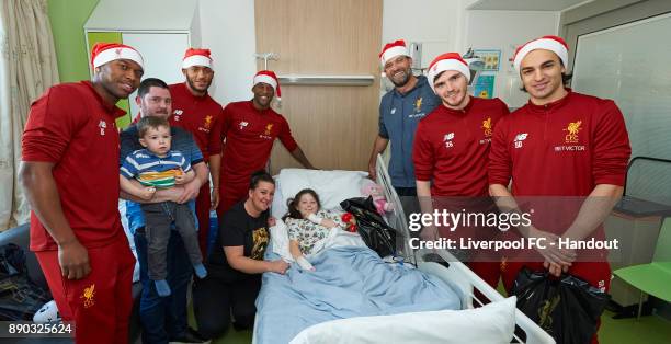 Liverpool manager Jurgen Klopp with players Daniel Sturridge, Joe Gomez, Georginio Wijnaldum, Andrew Robertson and Lazar Markovic making their annual...