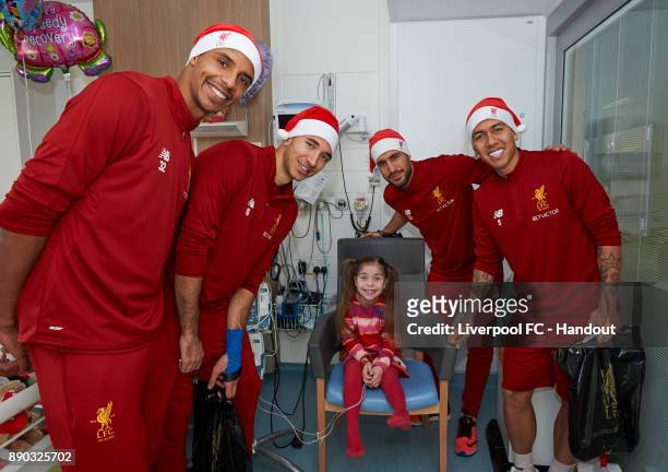 Liverpool players Joel Matip, Marko Grujic, Emre Can and Roberto Firmino making their annual visit to Alder Hey Children's Hospital on December 11,...