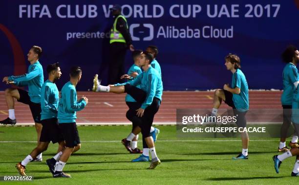 Real Madrid's players exercise on the pitch during a training session two days prior to their FIFA Club World Cup semi-final match at New York...