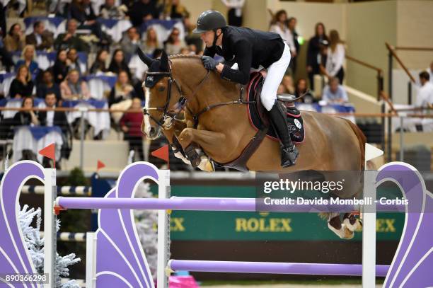 U2013 DECEMBER 09: Kevin STAUT of France, riding Reveur de Hurtebise HDC, during the 17th Rolex IJRC Top 10 Final. International Jumping Competition...