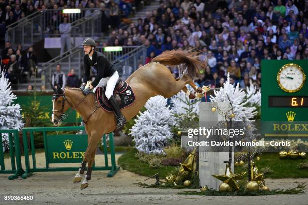 U2013 DECEMBER 09: Kevin STAUT of France, riding Reveur de Hurtebise HDC, during the 17th Rolex IJRC Top 10 Final. International Jumping Competition...