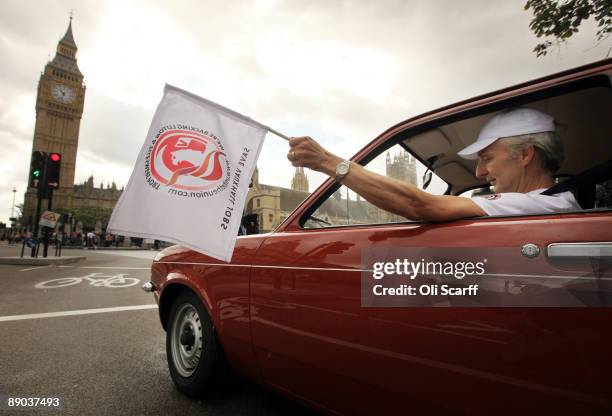 Convoy of Vauxhall cars drives around Parliament Square in Westminster in a protest to campaign to safeguard workers' jobs on July 15, 2009 in...