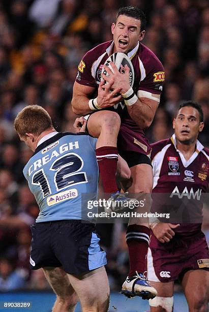 Darius Boyd of the Maroons catches the ball during game three of the ARL State of Origin series between the Queensland Maroons and New South Wales...