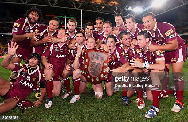The Maroons celebrate after game three of the ARL State of Origin series between the Queensland Maroons and the New South Wales Blues at Suncorp...